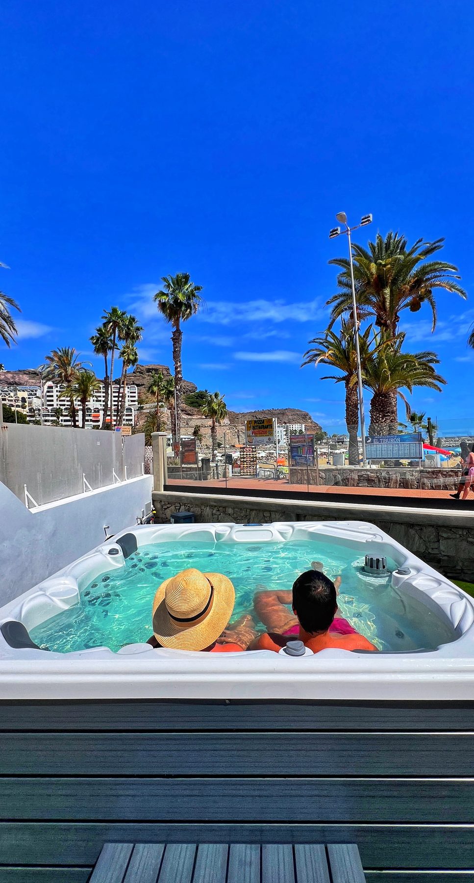 Relaxing in the private jacuzzi at golden hour
